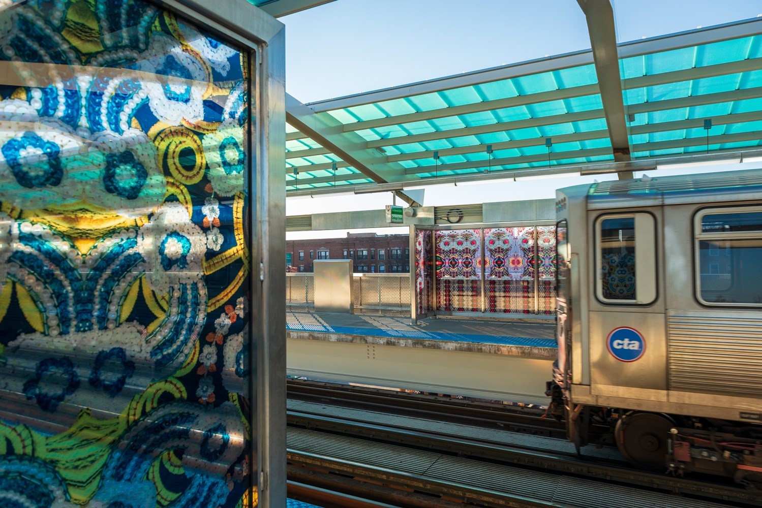 New artistically enhanced windbreaks at Garfield Green Line by Chicago artist Nick Cave